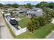 Lush backyard with patio, lawn, and boat parking, surrounded by a privacy fence at 656 40Th Ne Ave, St Petersburg, FL 33703