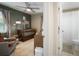 Bedroom leading into a bathroom with a shower/tub combination at 656 40Th Ne Ave, St Petersburg, FL 33703