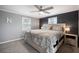 Bedroom featuring a bed with decorative pillows and comforter and a ceiling fan at 656 40Th Ne Ave, St Petersburg, FL 33703