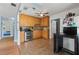 Updated kitchen features granite countertops, stainless steel appliances, wooden cabinetry and tile floors at 6982 78Th N Ave, Pinellas Park, FL 33781