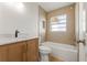 Bathroom with a sleek vanity, modern fixtures, and a tiled shower-tub combo at 7400 Belvedere Ter, New Port Richey, FL 34655