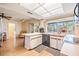 Well-lit kitchen with an island, and updated appliances at 8956 124Th Way, Seminole, FL 33772