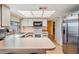 Bright kitchen featuring white cabinets and countertops at 8956 124Th Way, Seminole, FL 33772