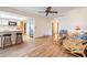 Cozy living room with laminate flooring and open layout at 8956 124Th Way, Seminole, FL 33772