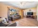 Inviting living room with new floors, large window and neutral decor at 8956 124Th Way, Seminole, FL 33772