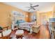 Cozy main bedroom with wood floors and decorative furniture at 8956 124Th Way, Seminole, FL 33772
