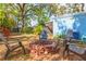 Backyard with a cozy fire pit and outdoor seating, perfect for gatherings at 904 E Patterson St, Tampa, FL 33604