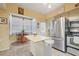 Bright kitchen featuring a butcher block island, stainless steel appliances, and eat-in breakfast nook at 916 E Broad St, Tampa, FL 33604