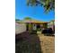 View of the backyard showing patio and sunshade at 10411 Summerview Cir, Riverview, FL 33578