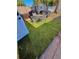 Backyard patio with artificial turf and outdoor seating at 10411 Summerview Cir, Riverview, FL 33578