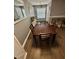 Inviting dining room featuring a wooden table with chairs and wood-look flooring at 10411 Summerview Cir, Riverview, FL 33578