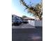 View of the home with a long driveway and well-maintained landscaping at 10411 Summerview Cir, Riverview, FL 33578