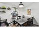 Charming dining room featuring a dark wood table set and rustic decorations for a cozy atmosphere at 10501 Bay Hills Cir, Thonotosassa, FL 33592
