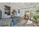 Enclosed porch with patio table and chairs at 10501 Bay Hills Cir, Thonotosassa, FL 33592