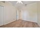 Clean bedroom with neutral carpet and walls and a ceiling fan at 10716 Ashford Oaks Dr, Tampa, FL 33625