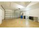Spacious 2 car garage with an automatic opener and sealed concrete floor at 10716 Ashford Oaks Dr, Tampa, FL 33625