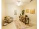 Home office with a modern desk, comfortable chair, and soft, natural lighting at 10716 Ashford Oaks Dr, Tampa, FL 33625