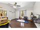 Well-lit bedroom with hardwood flooring, vaulted ceiling, and dual closets at 11207 Donneymoor Dr, Riverview, FL 33569