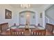 Charming dining area featuring an elegant chandelier and seamless flow into other living spaces at 11924 Brighton Knoll Loop, Riverview, FL 33579