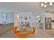Open-concept design showcasing a modern kitchen with stainless steel appliances and a breakfast nook at 11924 Brighton Knoll Loop, Riverview, FL 33579