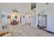 Bright and open living room featuring high ceilings, stylish decor, and tile flooring at 11924 Brighton Knoll Loop, Riverview, FL 33579