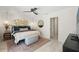 Well-lit primary bedroom with decorative wall accents and neutral tones at 1240 Harbor Lake Dr, Largo, FL 33770