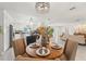 Open dining area with views of the kitchen and living room areas of the home at 1240 Harbor Lake Dr, Largo, FL 33770