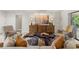 Well-decorated living room with natural wood accents, stylish furniture, and bright lighting at 1240 Harbor Lake Dr, Largo, FL 33770