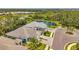 Aerial view showing a community with serene lake views, mature landscaping, and elegant residential homes at 12817 Cobalt Ter, Bradenton, FL 34211
