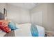 Neutral bedroom offering a full size bed and lots of natural light at 12817 Cobalt Ter, Bradenton, FL 34211