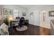 Office space features hardwood floors, a desk, and a comfortable chair, creating an ideal workspace at 12817 Cobalt Ter, Bradenton, FL 34211
