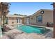 Inviting backyard pool area with a paved deck, water feature and access from multiple points of the home at 13035 91St Ave, Seminole, FL 33776