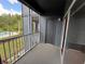 Relax on your private balcony with views of the community pool at 13243 Sanctuary Cove Dr # 204, Temple Terrace, FL 33637