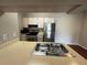 Bright kitchen features stainless steel appliances and plenty of counter space at 13243 Sanctuary Cove Dr # 204, Temple Terrace, FL 33637