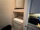 Practical laundry area equipped with a dryer and additional storage space at 13243 Sanctuary Cove Dr # 204, Temple Terrace, FL 33637