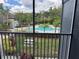 Enjoy a view of the community pool and picnic area from your private balcony at 13243 Sanctuary Cove Dr # 204, Temple Terrace, FL 33637