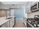 Modern kitchen with sleek countertops, stainless steel appliances, and a stylish faucet at 13614 Stevenson Ln, Odessa, FL 33556