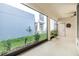 Covered patio with views of the low maintenance yard, offering seamless indoor-outdoor living at 13614 Stevenson Ln, Odessa, FL 33556