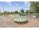 Well-equipped playground with swings, slides, picnic tables, and a shaded seating area at 13614 Stevenson Ln, Odessa, FL 33556