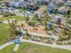 Community playground with a slide, swings, and other fun equipment surrounded by lush landscaping at 13614 Stevenson Ln, Odessa, FL 33556