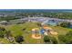 Overhead view of community athletic complex with football, baseball, and tennis facilities amidst lush greenery at 1400 63Rd S Ave, St Petersburg, FL 33705
