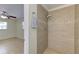 Bathroom shower with tile surround, modern shower head and decorative accent tile at 1400 63Rd S Ave, St Petersburg, FL 33705