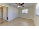 Bright bedroom with ceiling fan, double closets, tiled floors and lots of natural light at 1400 63Rd S Ave, St Petersburg, FL 33705