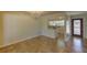 Open dining area with updated lighting fixture and tile flooring at 1400 63Rd S Ave, St Petersburg, FL 33705