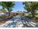 Charming single-story home with a long driveway and mature trees in a quiet neighborhood at 1400 63Rd S Ave, St Petersburg, FL 33705