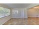 Large living room with lots of light from the large window at 1400 63Rd S Ave, St Petersburg, FL 33705