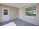 Enclosed outdoor patio with view to the backyard and access to the home at 1400 63Rd S Ave, St Petersburg, FL 33705