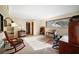 Bedroom with a desk, bookshelves, and a window providing natural light at 14825 Lake Magdalene Cir, Tampa, FL 33613