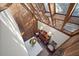 Overhead view of dining room with skylights and a stylish dining set and brick floors at 14825 Lake Magdalene Cir, Tampa, FL 33613