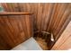 Wood staircase with carpeted treads, showcasing natural wood paneling and detail at 14825 Lake Magdalene Cir, Tampa, FL 33613